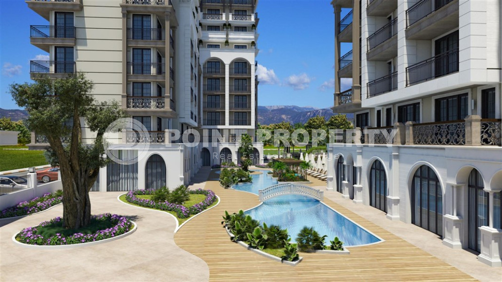 An elite complex at the excavation stage in the center of Alanya, within easy reach of the beach and the historical port.-id-1021-photo-8
