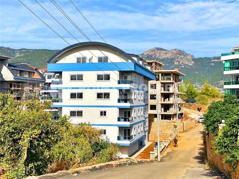 One-bedroom apartment, 70m² in a new complex with a swimming pool 1200m from the sea in Upper Oba, Alanya-id-2532-photo-1