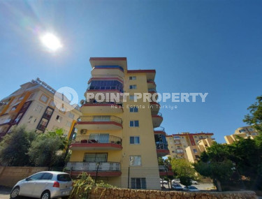 Квартира с двумя спальнями, 100м², в небольшой резиденции в 350м от моря в районе Тосмур, Алания-id-2533-фото-2