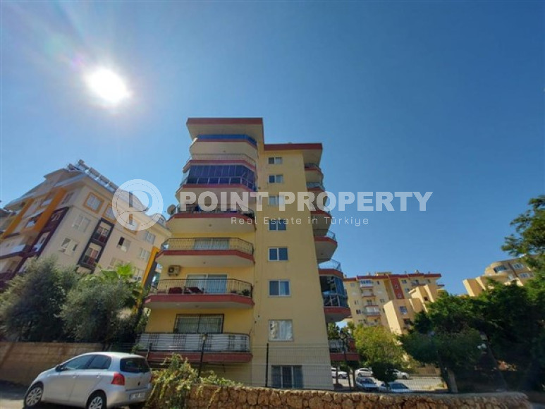 Квартира с двумя спальнями, 100м², в небольшой резиденции в 350м от моря в районе Тосмур, Алания-id-2533-фото-2