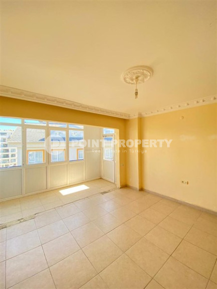 Квартира с двумя спальнями, 100м², в небольшой резиденции в 350м от моря в районе Тосмур, Алания-id-2533-фото-6