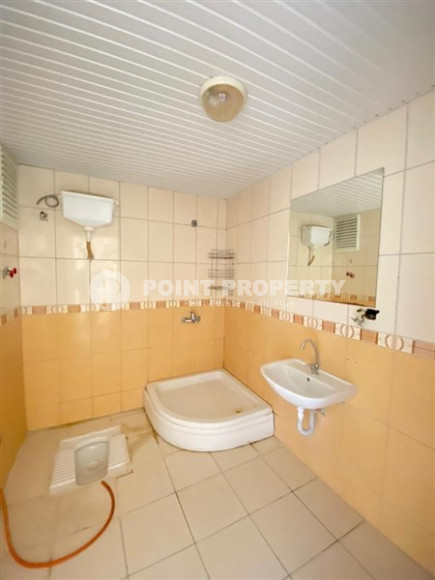 Квартира с двумя спальнями, 100м², в небольшой резиденции в 350м от моря в районе Тосмур, Алания-id-2533-фото-10