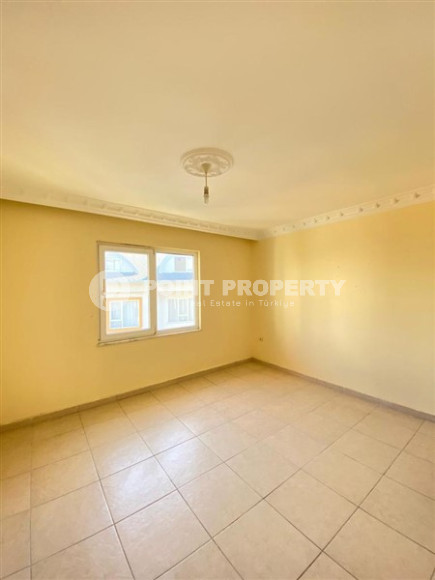 Квартира с двумя спальнями, 100м², в небольшой резиденции в 350м от моря в районе Тосмур, Алания-id-2533-фото-11