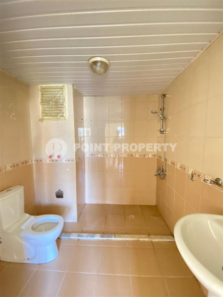 Квартира с двумя спальнями, 100м², в небольшой резиденции в 350м от моря в районе Тосмур, Алания-id-2533-фото-13