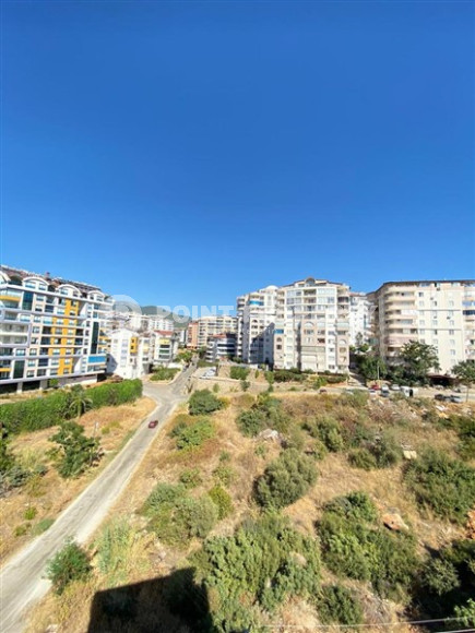 Квартира с двумя спальнями, 100м², в небольшой резиденции в 350м от моря в районе Тосмур, Алания-id-2533-фото-15