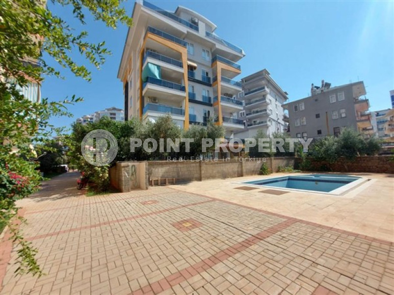 Квартира с двумя спальнями, 100м², в небольшой резиденции в 350м от моря в районе Тосмур, Алания-id-2533-фото-17