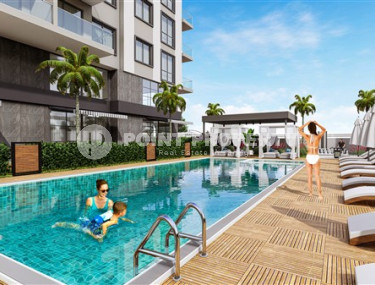 New one bedroom apartment, 55m², in a complex under construction in Alanya - Mahmutlar-id-2534-photo-2