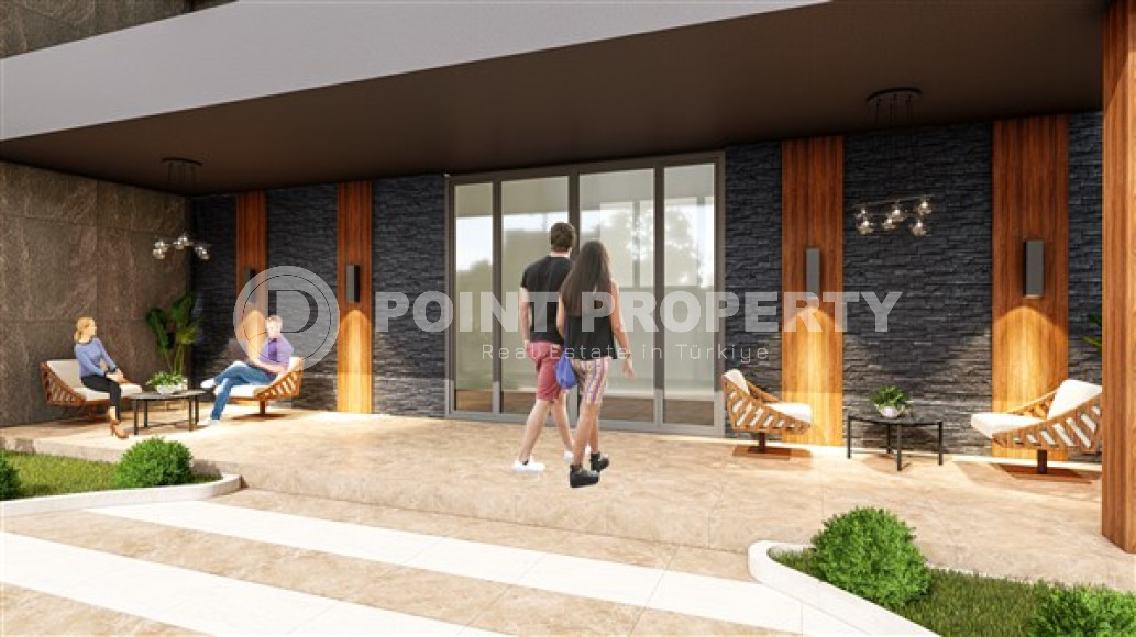 Новая квартира с одной спальней, 55м², в комплексе на этапе строительства в районе Алании - Махмутлар-id-2534-фото-5