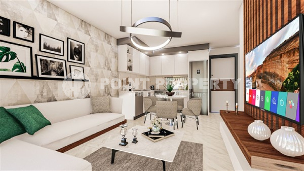 Новая квартира с одной спальней, 55м², в комплексе на этапе строительства в районе Алании - Махмутлар-id-2534-фото-8