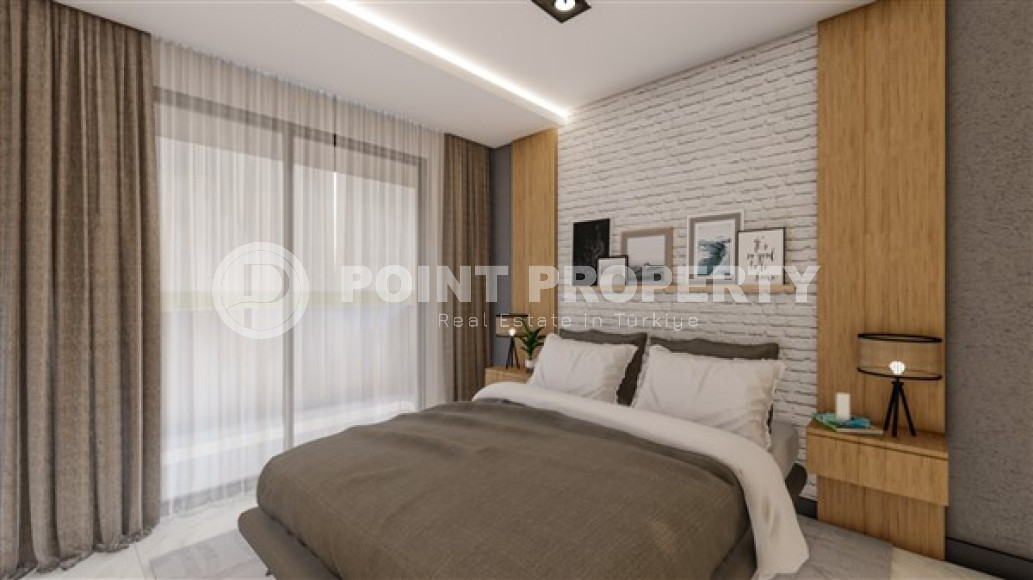 Новая квартира с одной спальней, 55м², в комплексе на этапе строительства в районе Алании - Махмутлар-id-2534-фото-10