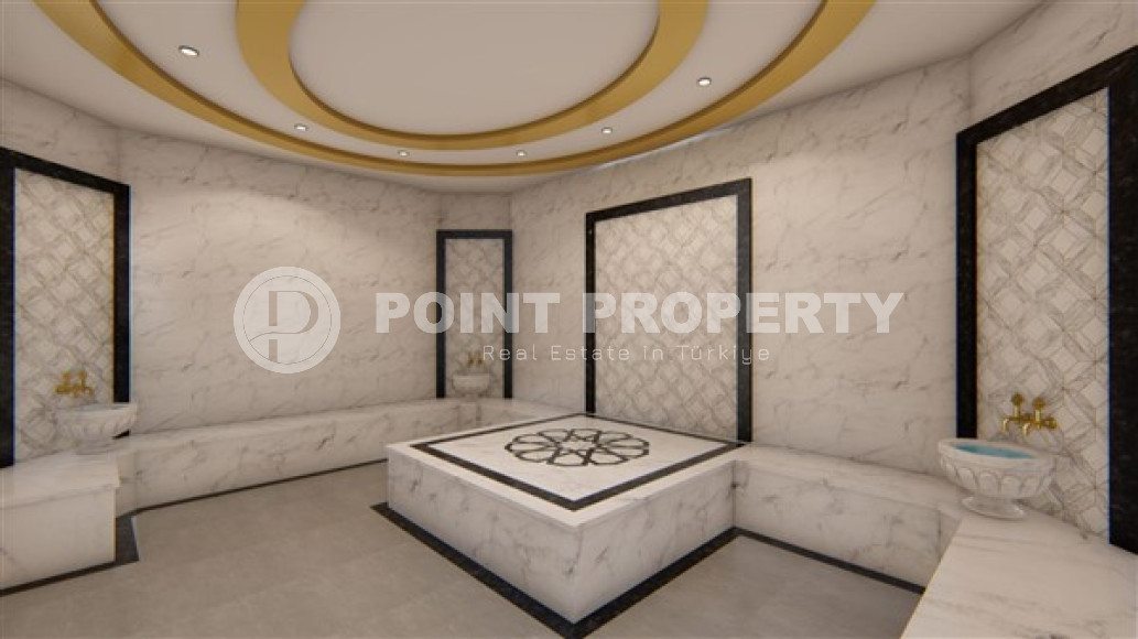 Новая квартира с одной спальней, 55м², в комплексе на этапе строительства в районе Алании - Махмутлар-id-2534-фото-15