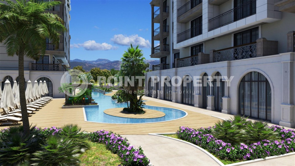 An elite complex at the excavation stage in the center of Alanya, within easy reach of the beach and the historical port.-id-1021-photo-10