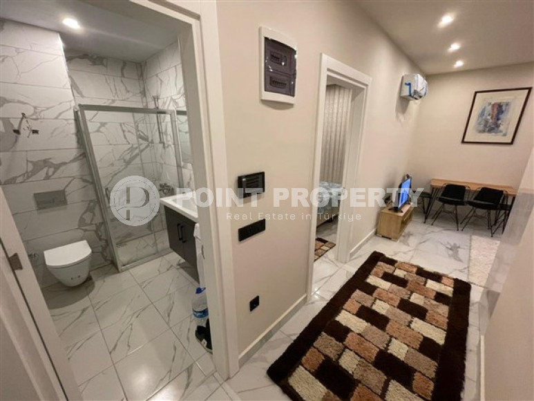 Furnished one-bedroom apartment, 48m², in a new residence with infrastructure in Oba, Alanya-id-2539-photo-10