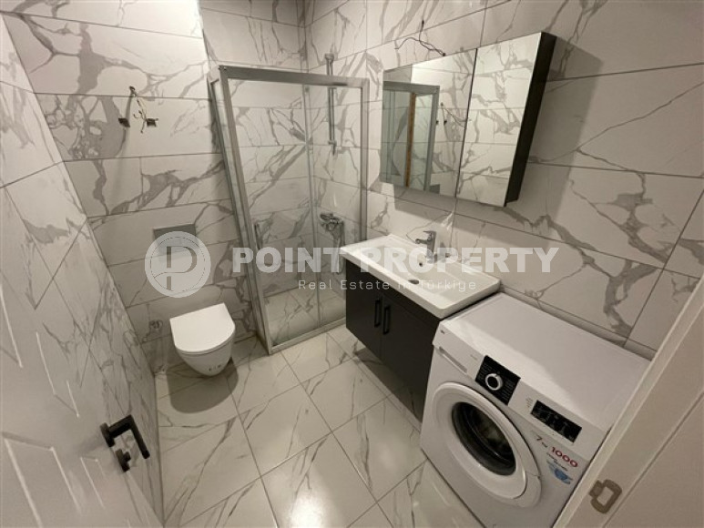 Furnished one-bedroom apartment, 48m², in a new residence with infrastructure in Oba, Alanya-id-2539-photo-11