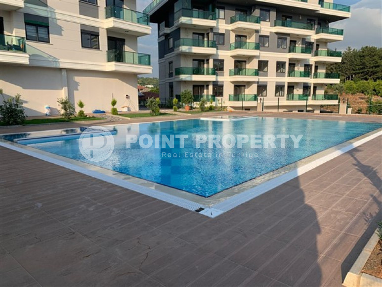Furnished one-bedroom apartment, 48m², in a new residence with infrastructure in Oba, Alanya-id-2539-photo-24