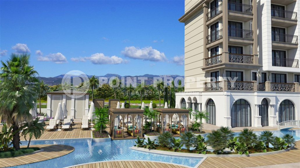 An elite complex at the excavation stage in the center of Alanya, within easy reach of the beach and the historical port.-id-1021-photo-11