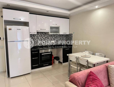 Элегантная просторная квартира 1+1, 70м², в комплексе с хорошей инфраструктурой в районе Алании Тосмур-id-2549-фото-4