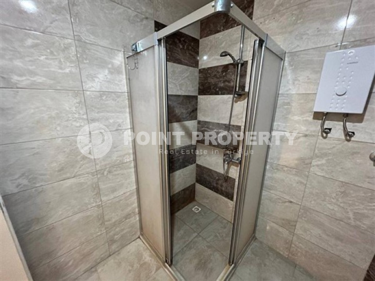 Элегантная просторная квартира 1+1, 70м², в комплексе с хорошей инфраструктурой в районе Алании Тосмур-id-2549-фото-9