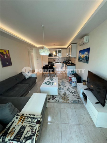 Elegant one-bedroom apartment, 86m², in a premium complex in Oba, Alanya.-id-2551-photo-2