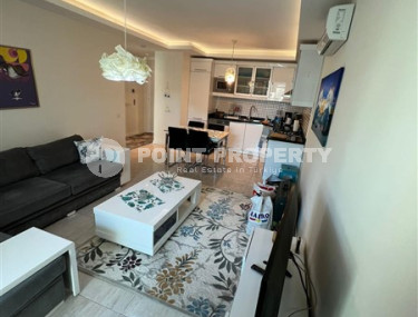 Elegant one-bedroom apartment, 86m², in a premium complex in Oba, Alanya.-id-2551-photo-3