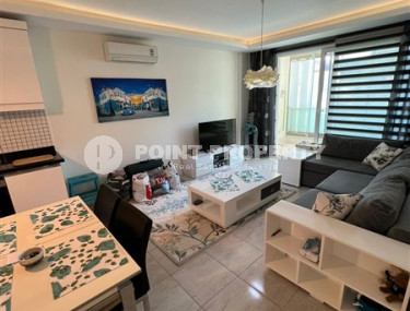 Elegant one-bedroom apartment, 86m², in a premium complex in Oba, Alanya.-id-2551-photo-4