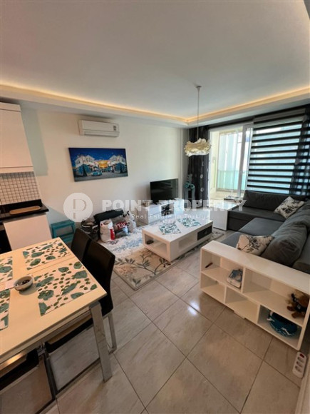 Elegant one-bedroom apartment, 86m², in a premium complex in Oba, Alanya.-id-2551-photo-4