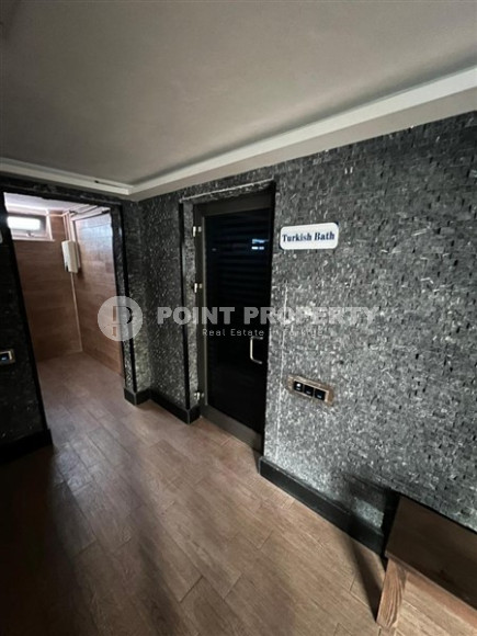 Elegant one-bedroom apartment, 86m², in a premium complex in Oba, Alanya.-id-2551-photo-13