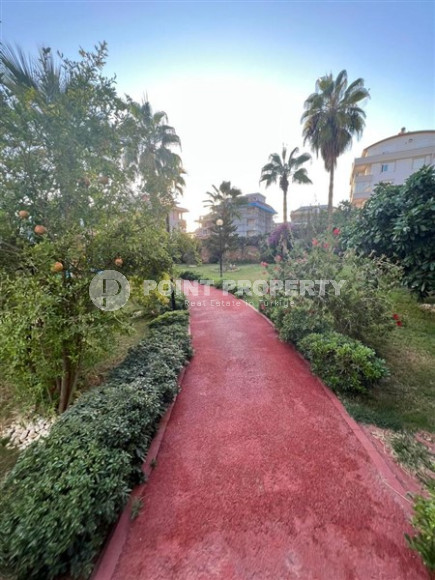 Elegant one-bedroom apartment, 86m², in a premium complex in Oba, Alanya.-id-2551-photo-23