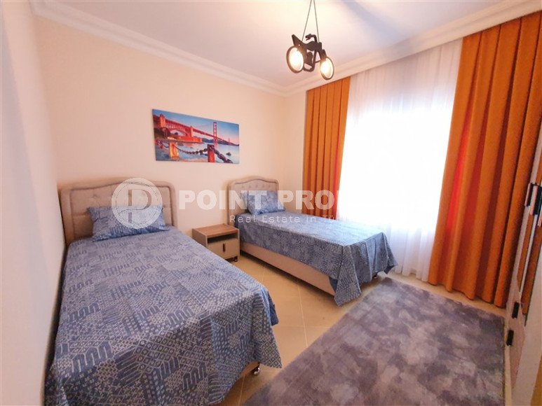 Furnished three-room apartment in Mahmutlar area with private garden, 130 m2-id-1219-photo-23