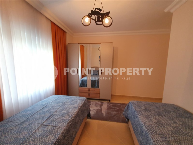 Furnished three-room apartment in Mahmutlar area with private garden, 130 m2-id-1219-photo-24