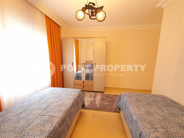Furnished three-room apartment in Mahmutlar area with private garden, 130 m2-id-1219-photo-25