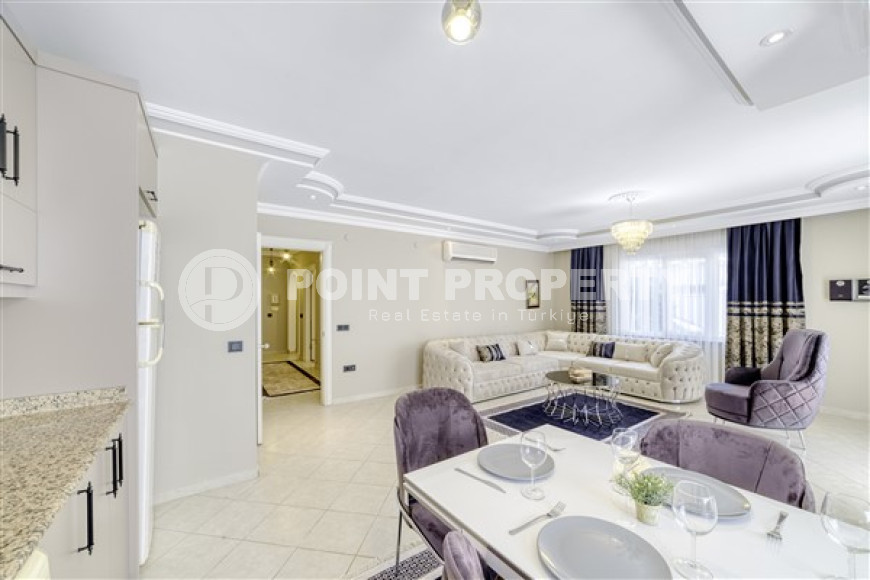 Three-room apartment, 110 m², with designer interior, in a complex with infrastructure in the center of Alanya-id-2555-photo-4