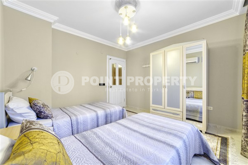 Three-room apartment, 110 m², with designer interior, in a complex with infrastructure in the center of Alanya-id-2555-photo-11