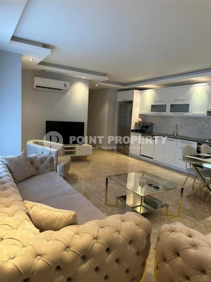 Completed one-bedroom apartment, 55m², in a modern complex with a swimming pool in the center of Alanya-id-2560-photo-5