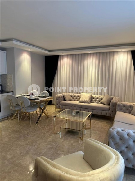 Completed one-bedroom apartment, 55m², in a modern complex with a swimming pool in the center of Alanya-id-2560-photo-7