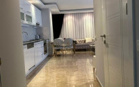 Completed one-bedroom apartment, 55m², in a modern complex with a swimming pool in the center of Alanya-id-2560-photo-8
