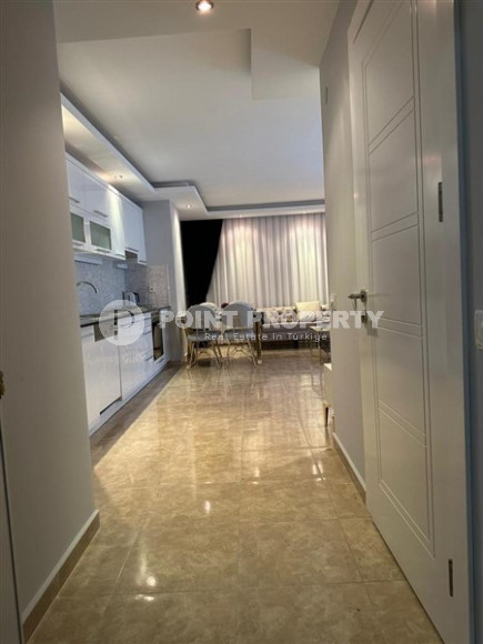 Completed one-bedroom apartment, 55m², in a modern complex with a swimming pool in the center of Alanya-id-2560-photo-8