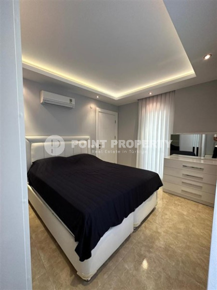 Completed one-bedroom apartment, 55m², in a modern complex with a swimming pool in the center of Alanya-id-2560-photo-13