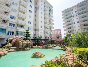 Spacious penthouse 4+1, 250m², 150m from the sea in the center of Tosmur, Alanya-id-2561-photo-1