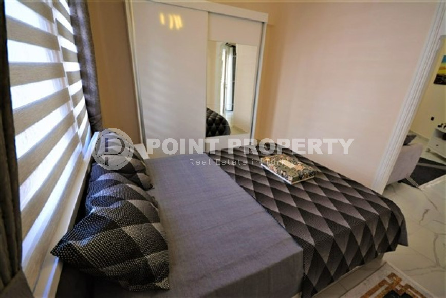 Готовая к проживанию, квартира 1+1, 65м², в резиденции с инфраструктурой в 300м от моря, Махмутлар-id-2568-фото-7