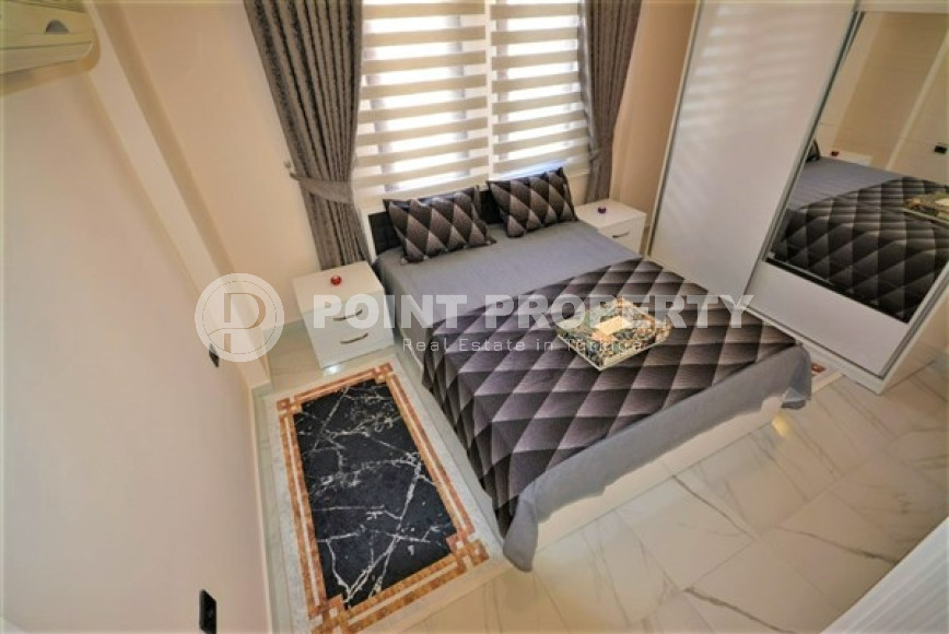 Готовая к проживанию, квартира 1+1, 65м², в резиденции с инфраструктурой в 300м от моря, Махмутлар-id-2568-фото-8