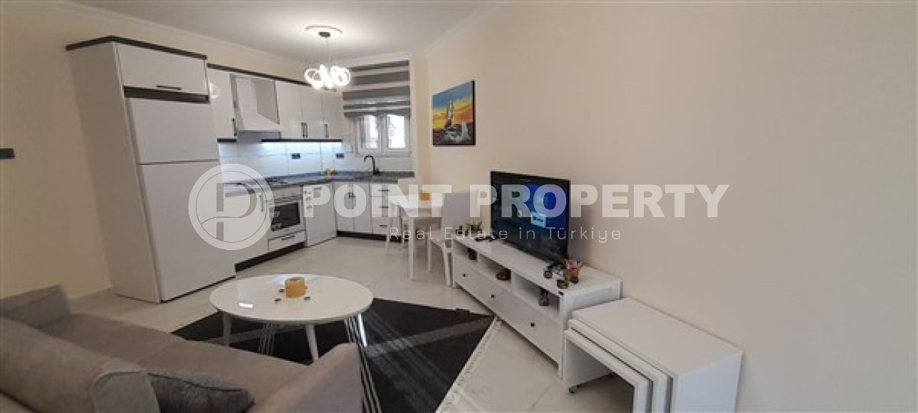 Готовая к проживанию, квартира 1+1, 65м², в резиденции с инфраструктурой в 300м от моря, Махмутлар-id-2568-фото-2