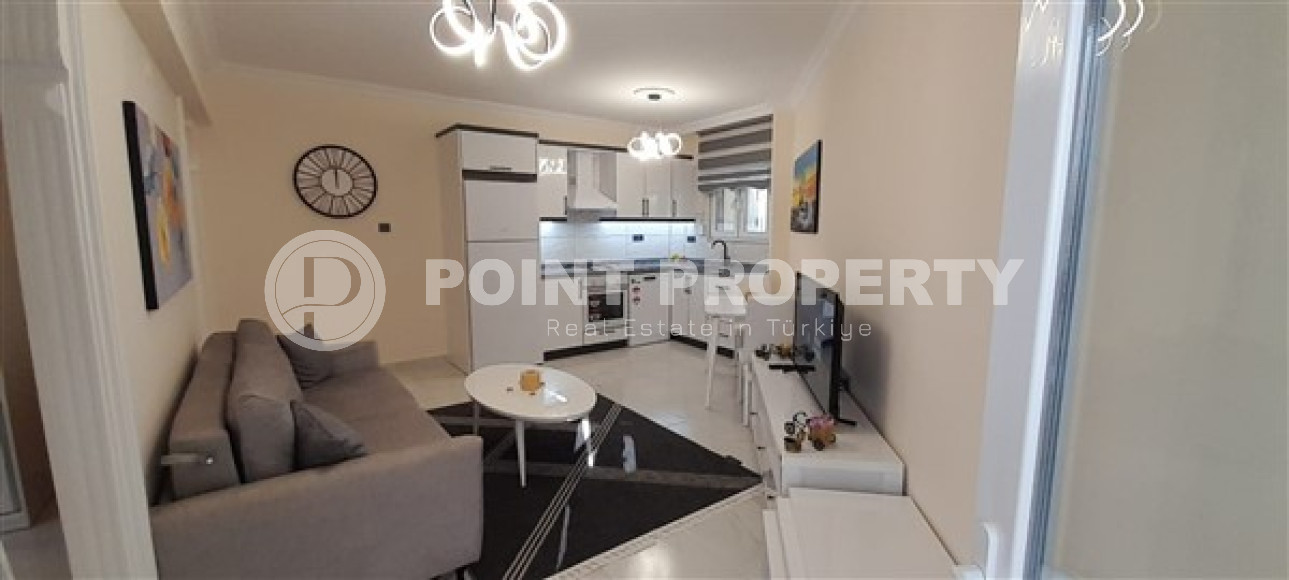 Готовая к проживанию, квартира 1+1, 65м², в резиденции с инфраструктурой в 300м от моря, Махмутлар-id-2568-фото-11