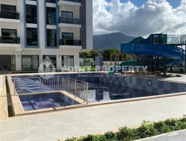 Квартира 1+1, 50м², с чистовой отделкой в новом комплексе премиум класса в районе Верхняя Оба, Алания.-id-2570-фото-2