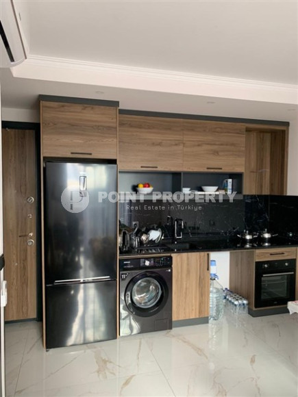 Квартира 1+1, 50м², с чистовой отделкой в новом комплексе премиум класса в районе Верхняя Оба, Алания.-id-2570-фото-9