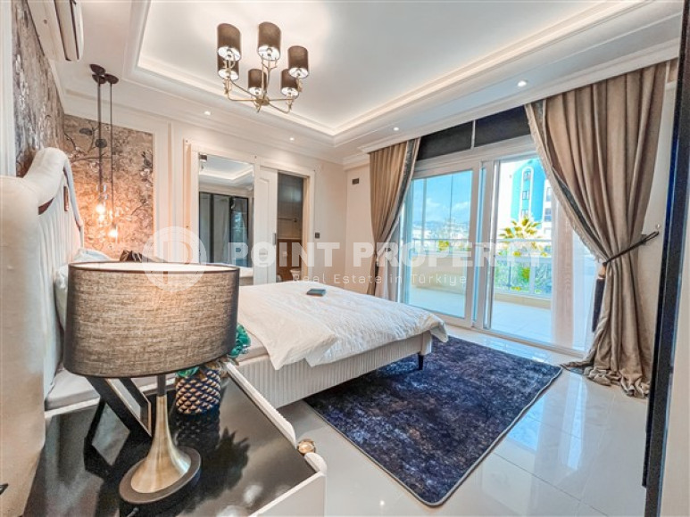 Designer three-room apartment, 125m², in Mahmutlar, Alanya, with sea views-id-2572-photo-9