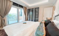 Designer three-room apartment, 125m², in Mahmutlar, Alanya, with sea views-id-2572-photo-11