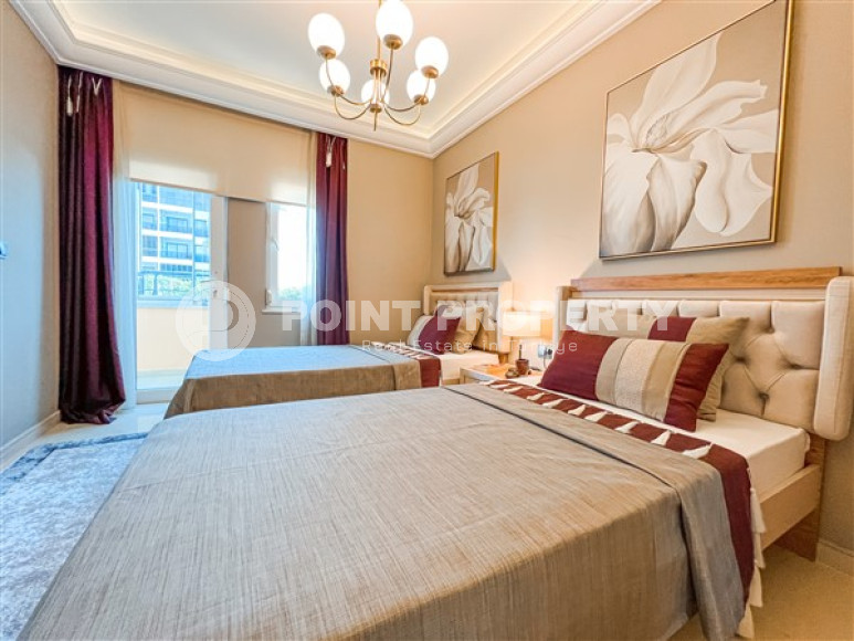 Designer three-room apartment, 125m², in Mahmutlar, Alanya, with sea views-id-2572-photo-12
