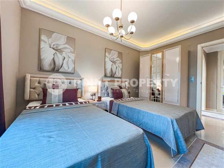 Designer three-room apartment, 125m², in Mahmutlar, Alanya, with sea views-id-2572-photo-13