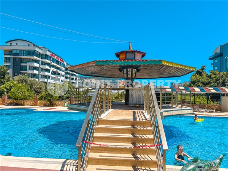 Designer three-room apartment, 125m², in Mahmutlar, Alanya, with sea views-id-2572-photo-22